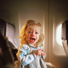 girl-crying-on-plane.jpg